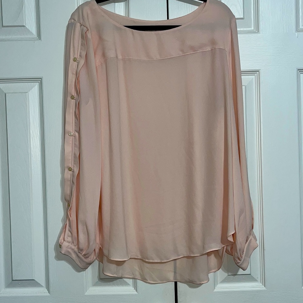 Blouse with buttons on sleeves